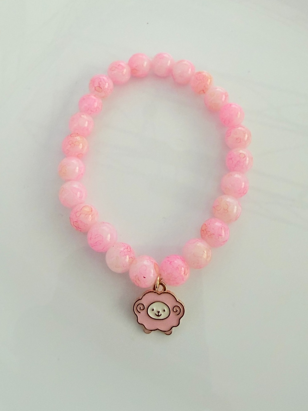 Delicate Pink Beaded Bracelet with Lamb Charm